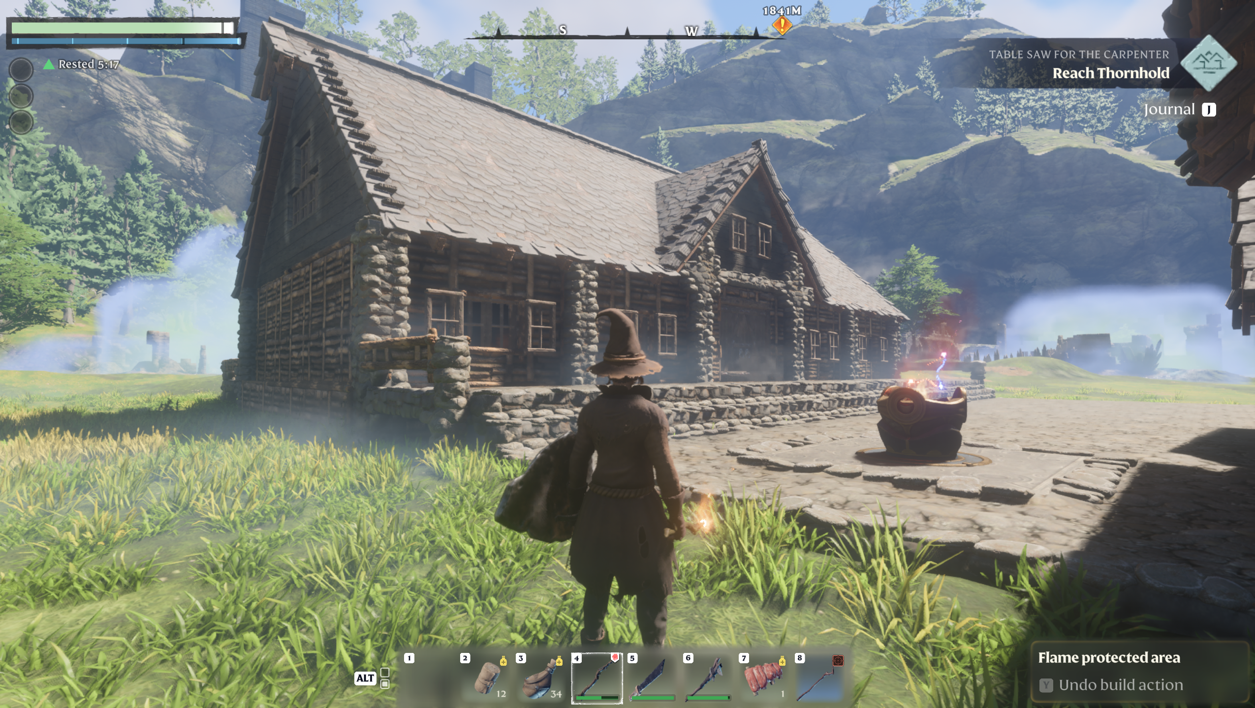 My Enshrouded character standing in front of a long ranch style home with a large pointed roof in the middle. It is wood with stone trim and a dark stone slated roof. It has double doors in the middle and 2 sets of windows on each side of the doors.